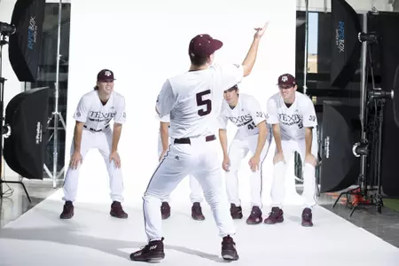 COLLEGE STATION, TX - January 12, 2022 - right hand pitcher Rawley Hector #5 of the Texas A&M Aggies, right hand pitcher Wyatt Tucker #36 of the Texas A&M Aggies, right hand pitcher Nathan Dettmer #35 of the Texas A&M Aggies, right hand pitcher Walker Zander #49 of the Texas A&M Aggies, and left hand pitcher Jonathan Childress #57 of the Texas A&M Aggies during the Texas A&M Aggies 2022 Baseball Photo Day in The Studio in Kyle Field College Station, TX. Photo By Craig Bisacre/Texas A&M Athletics