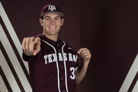 COLLEGE STATION, TX - January 12, 2022 - Pitcher Jacob Palisch #33 of the Texas A&M Aggies during the Texas A&M Aggies 2022 Baseball Photo Day in The Studio in Kyle Field in College Station, TX. Photo By Craig Bisacre/Texas A&M Athletics