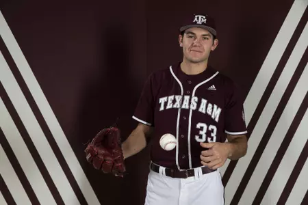 COLLEGE STATION, TX - January 12, 2022 - Pitcher Jacob Palisch #33 of the Texas A&M Aggies during the Texas A&M Aggies 2022 Baseball Photo Day in The Studio in Kyle Field in College Station, TX. Photo By Craig Bisacre/Texas A&M Athletics