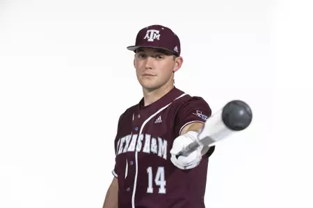 COLLEGE STATION, TX - January 12, 2022 - catcher Taylor Smith #14 of the Texas A&M Aggies during the Texas A&M Aggies 2022 Baseball Photo Day in The Studio in Kyle Field College Station, TX. Photo By Craig Bisacre/Texas A&M Athletics