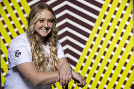 COLLEGE STATION, TX - January 20, 2022 - Catcher/Outfielder Mayce Allen #5 of the Texas A&M Aggies during Texas A&M Aggies Softball photo day in College Station, TX. Photo By Kate Luffman/Texas A&M Athletics