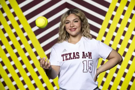 COLLEGE STATION, TX - January 20, 2022 - Infielder Hailey Gallegos #15 of the Texas A&M Aggies during Texas A&M Aggies Softball photo day in College Station, TX. Photo By Kate Luffman/Texas A&M Athletics