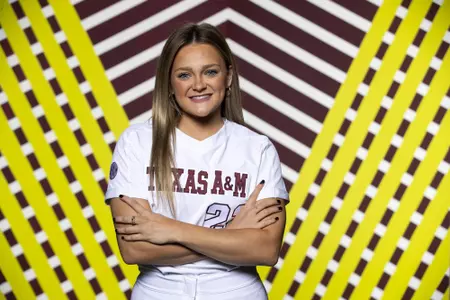 COLLEGE STATION, TX - January 20, 2022 - Infielder Cayden Baker #22 of the Texas A&M Aggies during Texas A&M Aggies Softball photo day in College Station, TX. Photo By Kate Luffman/Texas A&M Athletics