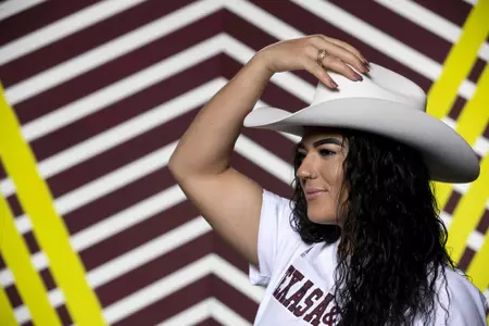COLLEGE STATION, TX - January 20, 2022 - Catcher/Utility Haley Lee #25 of the Texas A&M Aggies during Texas A&M Aggies Softball photo day in College Station, TX. Photo By Kate Luffman/Texas A&M Athletics