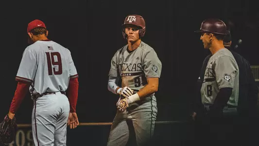 Jack Moss opens the game with a single for the Aggies