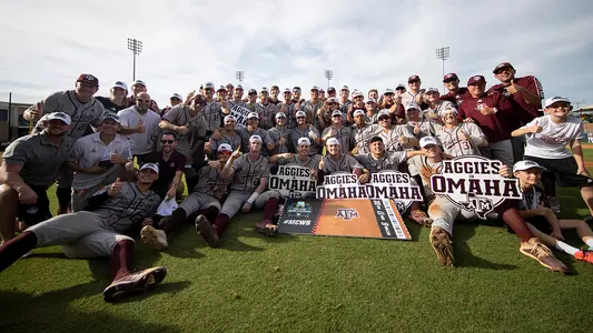 Team huddle after winning super regional