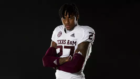 posed action photo of Antonio Johnson on black background