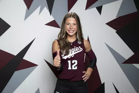 COLLEGE STATION, TX - August 12, 2022 - Libero/Defensive specialist Ava Underwood #12 of the Texas A&M Aggies during Texas A&M Aggies Volleyball photo day in College Station, TX. Photo By Brendall O'Banon/Texas A&M Athletics