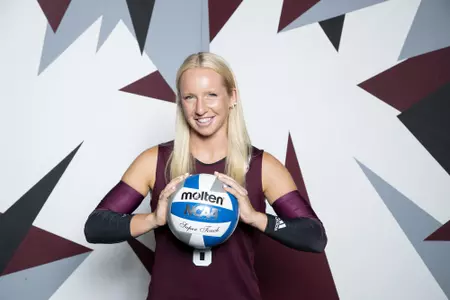 COLLEGE STATION, TX - August 12, 2022 - Libero/Defensive specialist Lauren Hogan #8 of the Texas A&M Aggies during Texas A&M Aggies Volleyball photo day in College Station, TX. Photo By Brendall O'Banon/Texas A&M Athletics