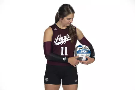 COLLEGE STATION, TX - August 12, 2022 - Libero/Defensive specialist Allison Fields #11 of the Texas A&M Aggies during Texas A&M Aggies Volleyball photo day in College Station, TX. Photo By Kate Luffman/Texas A&M Athletics