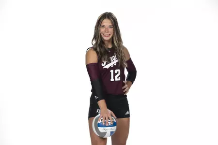 COLLEGE STATION, TX - August 12, 2022 - Libero/Defensive specialist Ava Underwood #12 of the Texas A&M Aggies during Texas A&M Aggies Volleyball photo day in College Station, TX. Photo By Kate Luffman/Texas A&M Athletics
