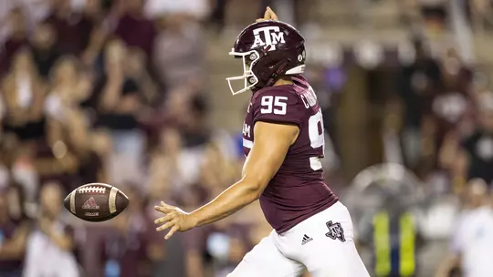 Nik Constantinou punts against Alabama