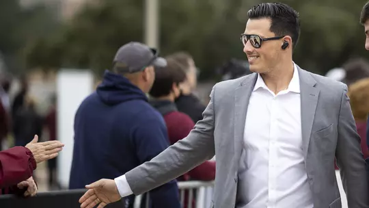 Nik Constantinou pregame spirit walk smiling