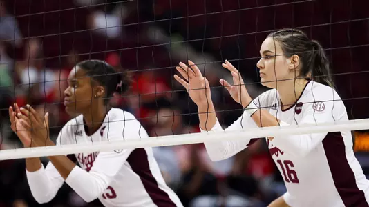 COLLEGE STATION, TX - September 09, 2022 - Middle blocker Madison Bowser #15 of the Texas A&M Aggies and Outside hitter Caroline Meuth #16 of the Texas A&M Aggies during the game between the Louisiana Ragin' Cajuns and the Texas A&M Aggies at Reed Arena in College Station, TX. Photo By Evan Pilat/Texas A&M Athletics