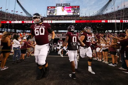 COLLEGE STATION, TX - September 17, 2022 - Offensive lineman Trey Zuhn III #60 of the Texas A&M Aggies, Wide receiver Ainias Smith #0 of the Texas A&M Aggies and Offensive lineman Hunter Erb #55 of the Texas A&M Aggies during the game between the Miami Hurricanes and the Texas A&M Aggies at Kyle Field in College Station, TX. Photo By Evan Pilat/Texas A&M Athletics