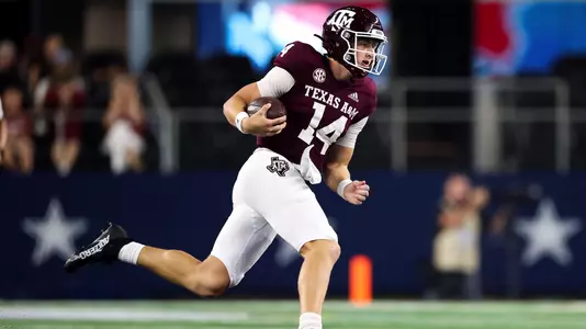 ARLINGTON, TX - September 24, 2022 - Quarterback Max Johnson #14 of the Texas A&M Aggies during the game between the Arkansas Razorbacks and the Texas A&M Aggies at AT&T Stadium in Arlington, Texas. Photo By Craig Bisacre/Texas A&M Athletics