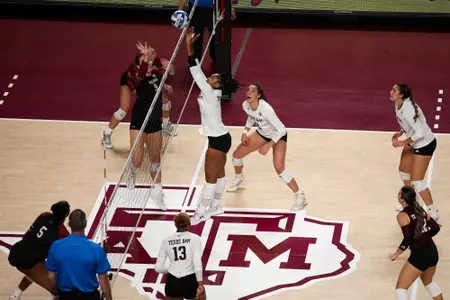 COLLEGE STATION, TX - October 15, 2023 - Middle Blocker Ifenna Cos-Okpalla #1 of the Texas A&M Aggies during the game between the South Carolina Gamecocks and the Texas A&M Aggies at Reed Arena in College Station, TX. Photo By Brendall O'Banon/Texas A&M Athletics