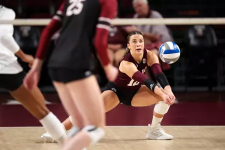 COLLEGE STATION, TX - October 15, 2023 - Libero/Defensive Specialist Ava Underwood #12 of the Texas A&M Aggies during the game between the South Carolina Gamecocks and the Texas A&M Aggies at Reed Arena in College Station, TX. Photo By Brendall O'Banon/Texas A&M Athletics