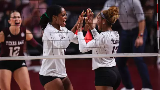 COLLEGE STATION, TX - October 01, 2023 - Outside Hitter Bianna Muoneke #13 of the Texas A&M Aggies and Middle Blocker Ifenna Cos-Okpalla #1 of the Texas A&M Aggies during the game between the Missouri Tigers and the Texas A&M Aggies at Reed Arena in College Station, TX. Photo By Craig Bisacre/Texas A&M Athletics