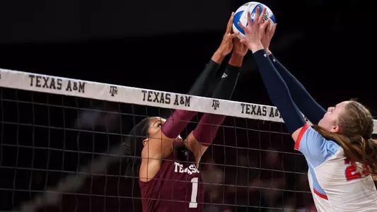 COLLEGE STATION, TX - September 15, 2023 - Middle Blocker Ifenna Cos-Okpalla #1 of the Texas A&M Aggies during the game between the Liberty Flames and the Texas A&M Aggies at Reed Arena in College Station, TX. Photo By Brendall O'Banon/Texas A&M Athletics