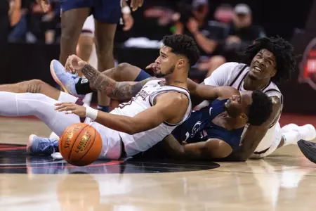 KISSIMMEE, FL - November 23, 2023 - Guard Jace Carter #0 of the Texas A&M Aggies and Forward Solomon Washington #13 of the Texas A&M Aggies during the game between the Penn State Nittany Lions and the Texas A&M Aggies at State Farm Field House at ESPN Wide World of Sports Complex in Kissimmee, FL. Photo By Craig Bisacre/Texas A&M Athletics