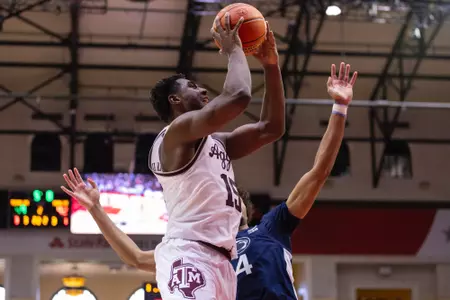 KISSIMMEE, FL - November 23, 2023 - Forward Henry Coleman #15 of the Texas A&M Aggies during the game between the Penn State Nittany Lions and the Texas A&M Aggies at State Farm Field House at ESPN Wide World of Sports Complex in Kissimmee, FL. Photo By Craig Bisacre/Texas A&M Athletics