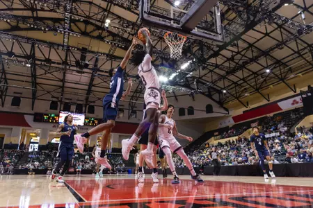 KISSIMMEE, FL - November 23, 2023 - Forward Solomon Washington #13 of the Texas A&M Aggies during the game between the Penn State Nittany Lions and the Texas A&M Aggies at State Farm Field House at ESPN Wide World of Sports Complex in Kissimmee, FL. Photo By Craig Bisacre/Texas A&M Athletics