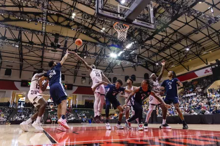 KISSIMMEE, FL - November 23, 2023 - Forward Henry Coleman #15 of the Texas A&M Aggies during the game between the Penn State Nittany Lions and the Texas A&M Aggies at State Farm Field House at ESPN Wide World of Sports Complex in Kissimmee, FL. Photo By Craig Bisacre/Texas A&M Athletics