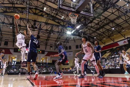 KISSIMMEE, FL - November 23, 2023 - Forward Henry Coleman #15 of the Texas A&M Aggies during the game between the Penn State Nittany Lions and the Texas A&M Aggies at State Farm Field House at ESPN Wide World of Sports Complex in Kissimmee, FL. Photo By Craig Bisacre/Texas A&M Athletics