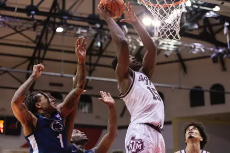 KISSIMMEE, FL - November 23, 2023 - Forward Henry Coleman #15 of the Texas A&M Aggies during the game between the Penn State Nittany Lions and the Texas A&M Aggies at State Farm Field House at ESPN Wide World of Sports Complex in Kissimmee, FL. Photo By Craig Bisacre/Texas A&M Athletics