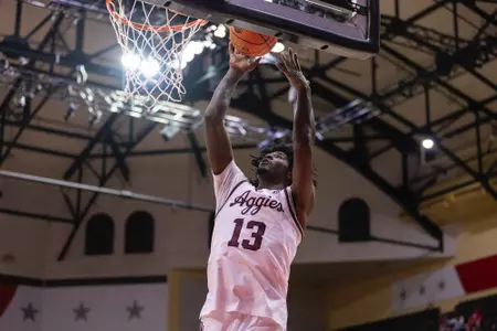 KISSIMMEE, FL - November 23, 2023 - Forward Solomon Washington #13 of the Texas A&M Aggies during the game between the Penn State Nittany Lions and the Texas A&M Aggies at State Farm Field House at ESPN Wide World of Sports Complex in Kissimmee, FL. Photo By Craig Bisacre/Texas A&M Athletics
