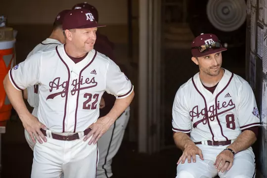COLLEGE STATION, TX - May 15, 2022 - Head Coach Jim Schlossnagle of the Texas A&M Aggies and Assistant Coach Michael Earley of the Texas A&M Aggies during the game between the Mississippi State Bulldogs and the Texas A&M Aggies at Blue Bell Park in College Station, TX. Photo By Kate Luffman/Texas A&M Athletics
