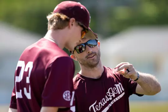 OMAHA, NE - June 15, 2022 - Assistant Coach Michael Earley of the Texas A&M Aggies during practice at Bellevue East in Omaha, Nebraska. Photo By Kate Luffman/Texas A&M Athletics
