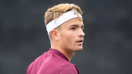 COLLEGE STATION, TX - March 11, 2022 - Raphael Perot of the Texas A&M Aggies during the game between the Commodores and the Texas A&M Aggies at Mitchell Tennis Center in College Station, TX. Photo By Hayden Carroll/Texas A&M Athletics