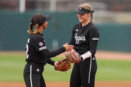 COLLEGE STATION, TX - March 18, 2023 - Infielder Rylen Wiggins #2 of the Texas A&M Aggies and Pitcher Shaylee Ackerman #10 of the Texas A&M Aggies during the game between the Georgia Bulldogs and the Texas A&M Aggies at Davis Diamond in College Station, TX. Photo By Evan Pilat/Texas A&M Athletics