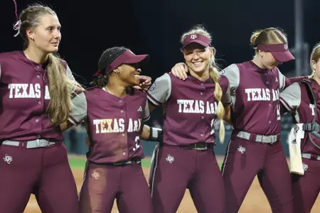 COLLEGE STATION, TX - March 22, 2023 - Infielder Koko Wooley #3 of the Texas A&M Aggies and Pitcher Shaylee Ackerman #10 of the Texas A&M Aggies during the game between the LA Tech Bulldogs and the Texas A&M Aggies at Davis Diamond in College Station, TX. Photo By Evan Pilat/Texas A&M Athletics