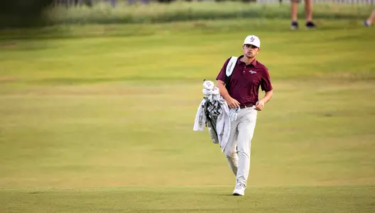 Daniel Rodrigues walks the Traditions Club Course at the 2022 NCAA Bryan Regional