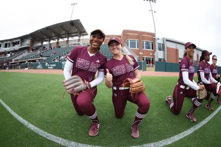 COLLEGE STATION, TX - March 29, 2023 - Outfielder Bre Warren #4 of the Texas A&M Aggies and Outfielder Paige Lott #7 of Texas A&M Aggies during the game between the Incarnate Word Cardinals and the Texas A&M Aggies at Davis Diamond in College Station, TX. Photo By Evan Pilat/Texas A&M Athletics