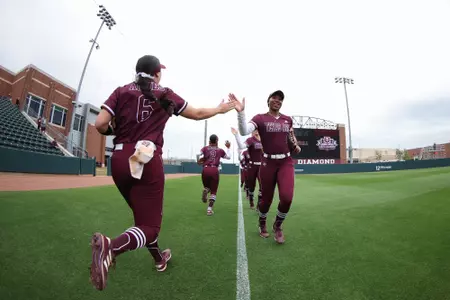 COLLEGE STATION, TX - March 29, 2023 - Infielder Trinity Cannon #6 of the Texas A&M Aggies and Outfielder Bre Warren #4 of the Texas A&M Aggies during the game between the Incarnate Word Cardinals and the Texas A&M Aggies at Davis Diamond in College Station, TX. Photo By Evan Pilat/Texas A&M Athletics