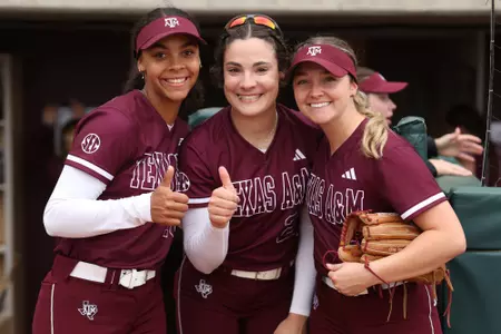 COLLEGE STATION, TX - March 29, 2023 - Outfielder Keely Williams #18 of the Texas A&M Aggies and Catcher/Outfielder Riley Valentine #27 of the Texas A&M Aggies and Outfielder Paige Lott #7 of Texas A&M Aggies during the game between the Incarnate Word Cardinals and the Texas A&M Aggies at Davis Diamond in College Station, TX. Photo By Evan Pilat/Texas A&M Athletics