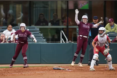 COLLEGE STATION, TX - March 29, 2023 - Catcher/Infielder Gracyn Coleman #22 of the Texas A&M Aggies and Catcher Julia Cottrill #42 of the Texas A&M Aggies during the game between the Incarnate Word Cardinals and the Texas A&M Aggies at Davis Diamond in College Station, TX. Photo By Evan Pilat/Texas A&M Athletics