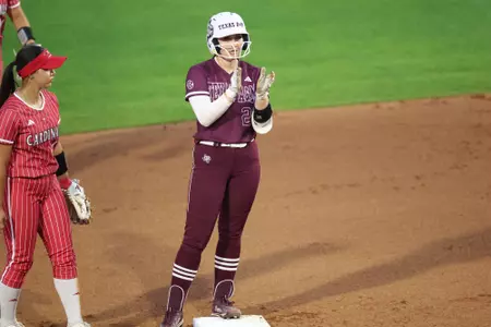COLLEGE STATION, TX - March 29, 2023 - Catcher/Infielder Gracyn Coleman #22 of the Texas A&M Aggies during the game between the Incarnate Word Cardinals and the Texas A&M Aggies at Davis Diamond in College Station, TX. Photo By Evan Pilat/Texas A&M Athletics