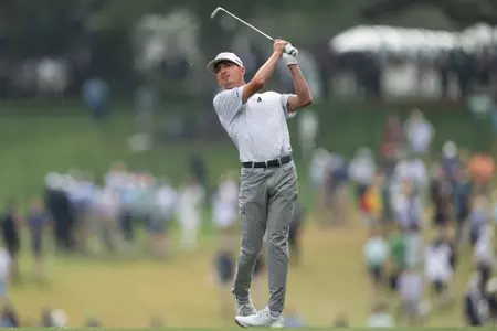 Amateur Sam Bennett of the United States plays a stroke on the No. 1 hole during the second round of the 2023 Masters Tournament at Augusta National Golf Club, Friday, April 7, 2023.
