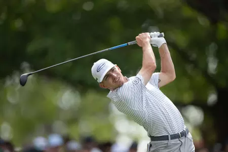 Amateur Sam Bennett of the United States plays a stroke from the No. 4 tee during the second round of the 2023 Masters Tournament at Augusta National Golf Club, Friday, April 7, 2023.