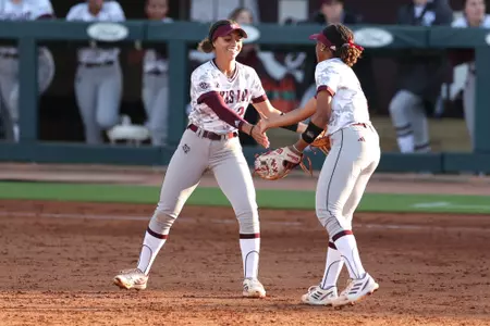 COLLEGE STATION, TX - April 12, 2023 - Infielder Rylen Wiggins #2 of the Texas A&M Aggies and Infielder Koko Wooley #3 of the Texas A&M Aggies during the game between the Louisiana Ragin' Cajuns and the Texas A&M Aggies at Davis Diamond in College Station, TX. Photo By Evan Pilat/Texas A&M Athletics
