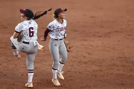 COLLEGE STATION, TX - April 12, 2023 - Infielder Trinity Cannon #6 of the Texas A&M Aggies and Infielder Rylen Wiggins #2 of the Texas A&M Aggies during the game between the Louisiana Ragin' Cajuns and the Texas A&M Aggies at Davis Diamond in College Station, TX. Photo By Evan Pilat/Texas A&M Athletics