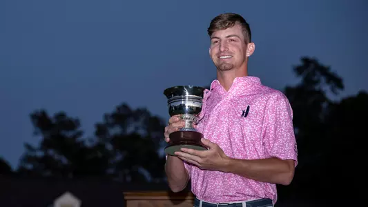 Sam Bennett poses with the Silver Cup from the Masters Tournament