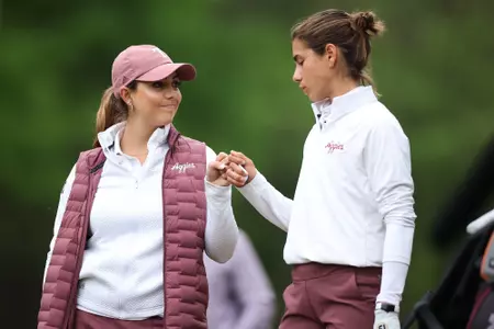 HOOVER, AL - April 16, 2023 - Assistant Coach Giovanna Maymon of the Texas A&M Aggies and Blanca Fernandez Garcia-Poggio of the Texas A&M Aggies during the SEC Women's Golf Championship finals between the Mississippi State Bulldogs and the Texas A&M Aggies at Greystone Golf and Country Club in Hoover, AL. Photo By Ethan Mito/Texas A&M Athletics