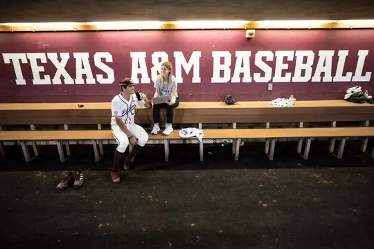 COLLEGE STATION, TX - April 19, 2023 - Outfielder Jace Laviolette #17 of the Texas A&M Aggies and Madeline Osborn during the game between the Prairie View A&M Panthers and the Texas A&M Aggies at Blue Bell Park in College Station, TX. Photo By Ethan Mito/Texas A&M Athletics