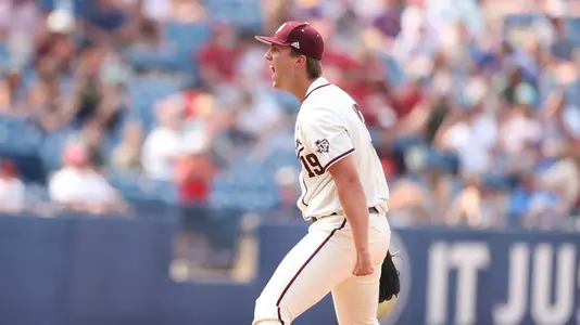 Troy Wansing celebrates closing out the Aggies' SEC Tournament semifinal game against Arkansas